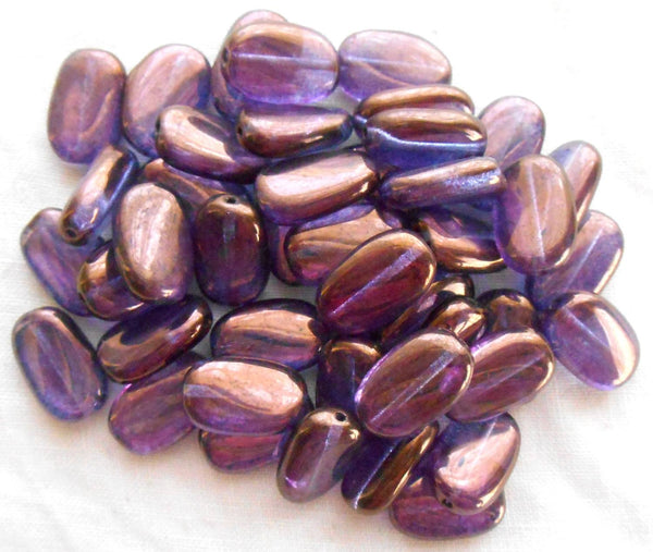 Lot of 25 Lumi Amethyst Iridescent slightly twisted oval Czech pressed Glass beads, 14mm x 8mm, C3325 - Glorious Glass Beads