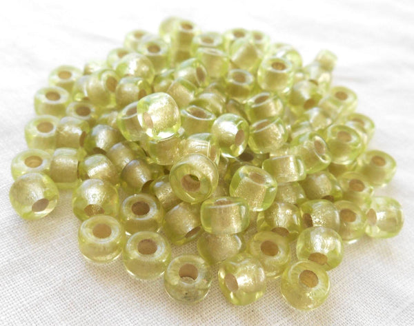Fifty 6mm Czech Jonquil yellow green silver lined glass pony roller beads, large hole crow beads, C1350 - Glorious Glass Beads
