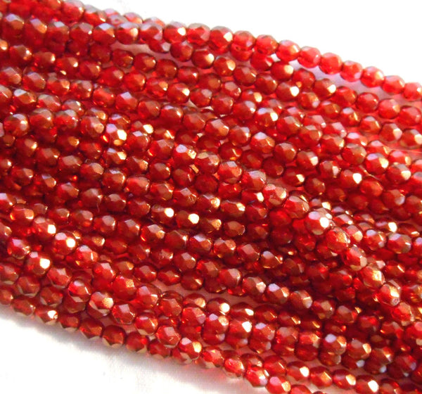 Fifty 4mm Halo Cardinal Red Czech glass firepolished, faceted round beads with a transparent gold finish, C60150
