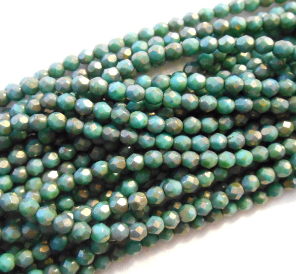 Fifty 4mm Turquoise Copper Picasso Czech glass firepolished, faceted round beads, C1650