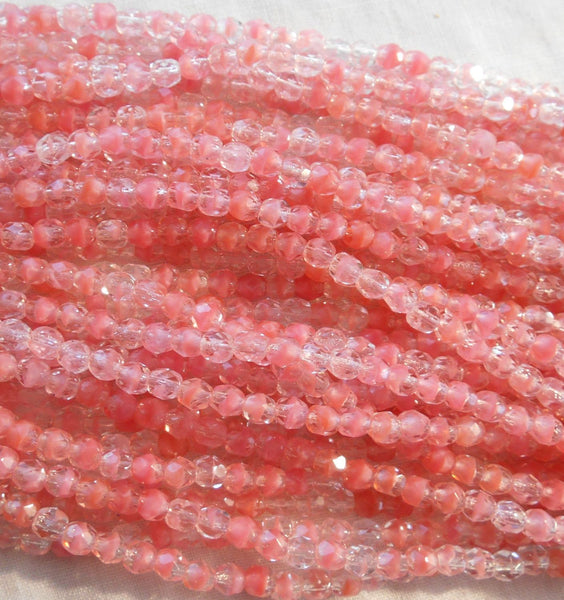 Fifty 4mm Czech glass, light Crystal Rosaline peach firepolished faceted round beads, C8550