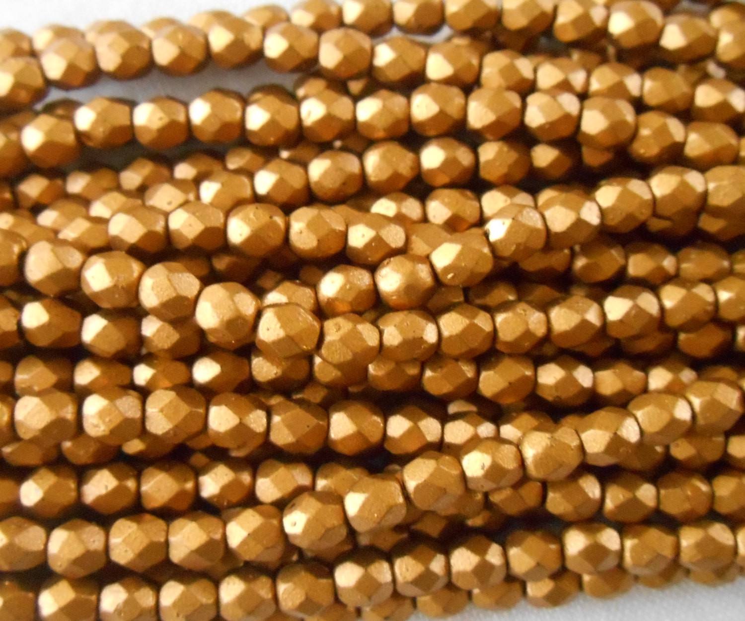Fifty 3mm Matte Metallic Gold Czech glass,  firepolished, faceted round beads, C1550 - Glorious Glass Beads