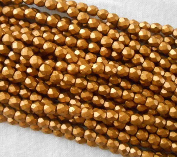 Fifty 4mm Matte Metallic Gold Goldenrod Czech glass firepolished, faceted round beads, C9650 - Glorious Glass Beads