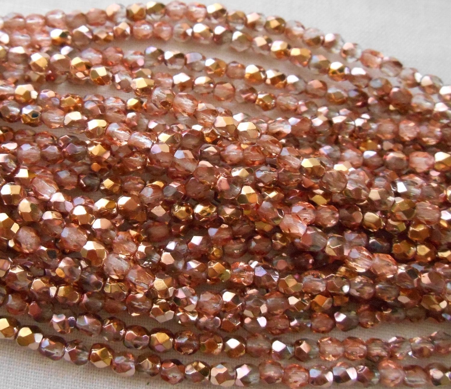 Fifty 3mm Apollo Gold Czech glass crystal and gold firepolished, faceted round beads, C8450 - Glorious Glass Beads