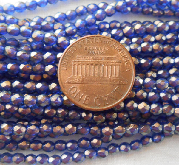 Fifty 3mm Halo Ultramarine Blue Czech glass over gold, firepolished, faceted round beads, C7750 - Glorious Glass Beads