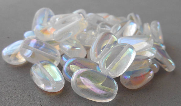 Lot of 25 Crystal AB slightly twisted oval Czech pressed Glass beads, 14mm x 8mm, C8625 - Glorious Glass Beads