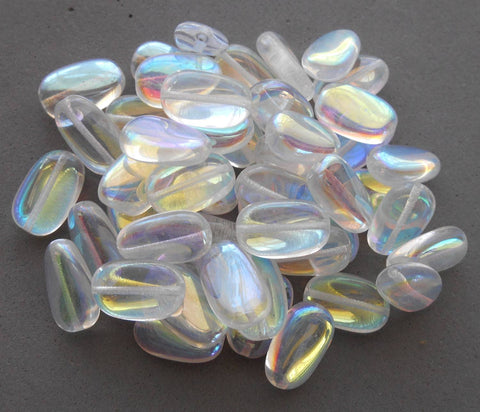 Lot of 25 Crystal AB slightly twisted oval Czech pressed Glass beads, 14mm x 8mm, C8625 - Glorious Glass Beads