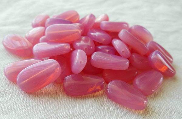 Lot of 25 Pink Rose Opal slightly twisted oval Czech pressed Glass beads, 14mm x 8mm, C23125 - Glorious Glass Beads