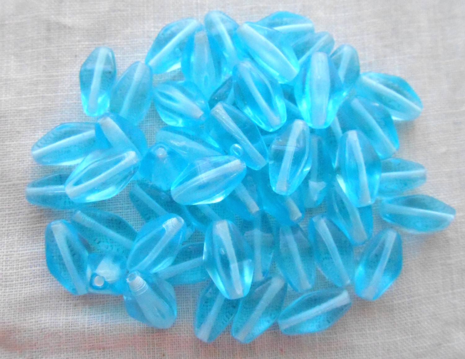 Lot of 25 11mm x 7mm Aqua Blue Czech glass lantern or tube beads, C9125 - Glorious Glass Beads