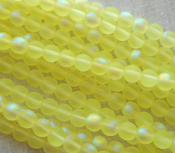 Fifty 6mm Matte Jonquile Yellow AB Czech glass druk beads, C9750 - Glorious Glass Beads