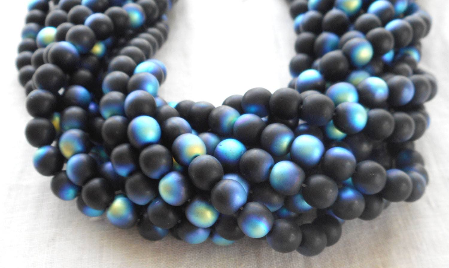 Fifty 6mm Jet Black Matte AB Czech glass druk beads, C2750 - Glorious Glass Beads