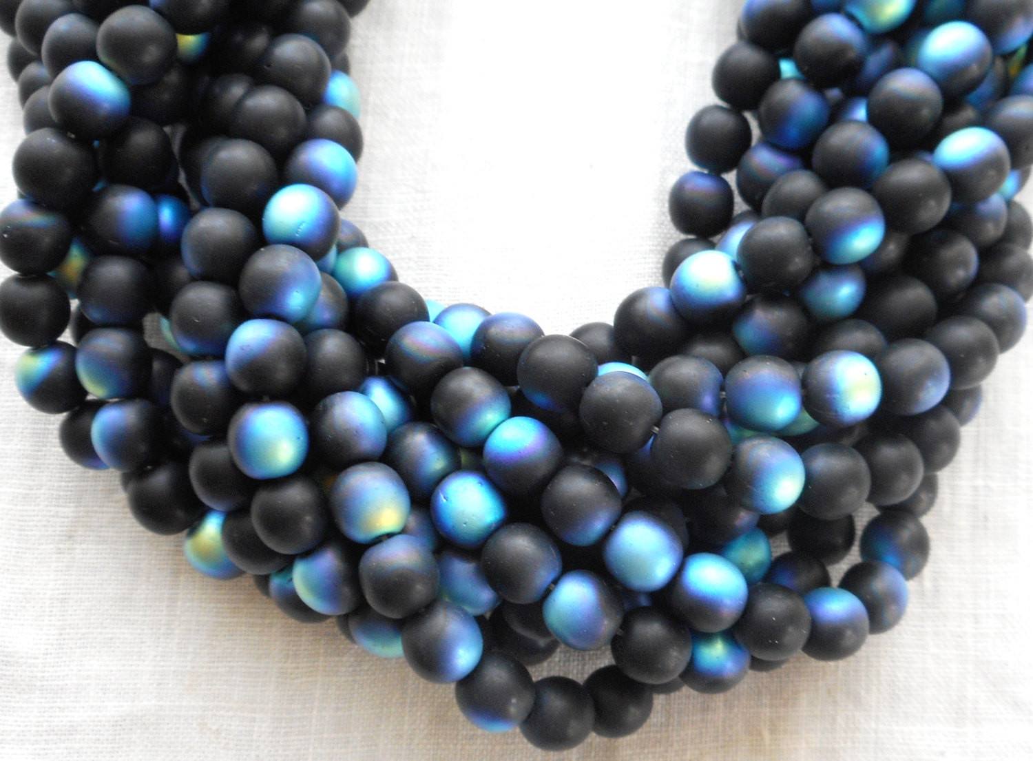 Fifty 6mm Jet Black Matte AB Czech glass druk beads, C2750 - Glorious Glass Beads