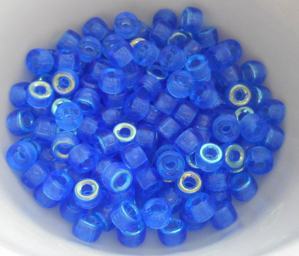 Fifty 6mm Czech Crystal Sapphire Blue AB pony roller beads, large hole crow beads, C7450 - Glorious Glass Beads