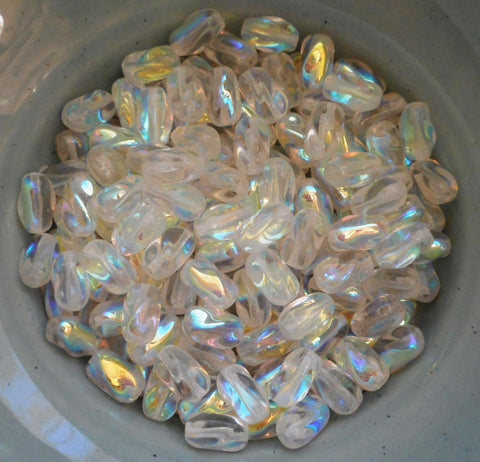 Lot of 25 9mm x 6mm Crystal AB Czech glass twisted oval beads, C3425 - Glorious Glass Beads