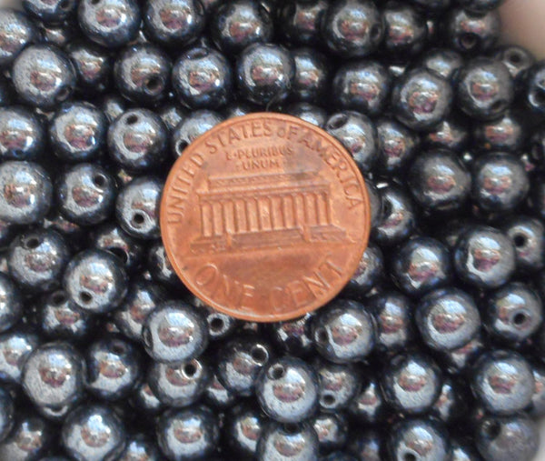 Fifty 6mm Czech Metallic Gray Hematite glass druk beads, C1450 - Glorious Glass Beads