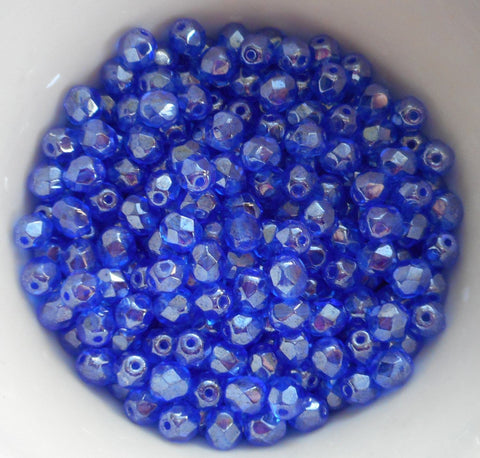 Lot of 25 6mm Sapphire Blue Iridescent Shimmer Czech glass firepolished, faceted beads, C7225 - Glorious Glass Beads