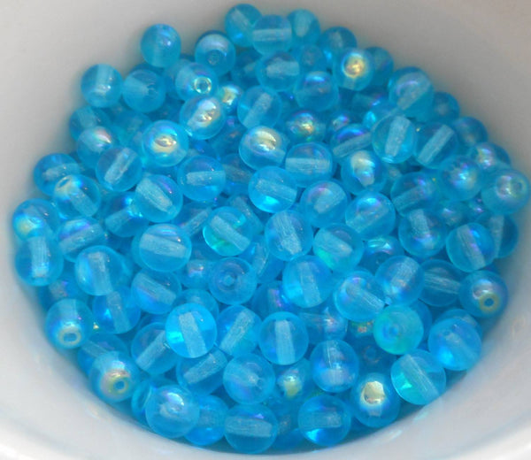 Fifty 6mm Czech glass Aqua AB druk beads, C2250 - Glorious Glass Beads