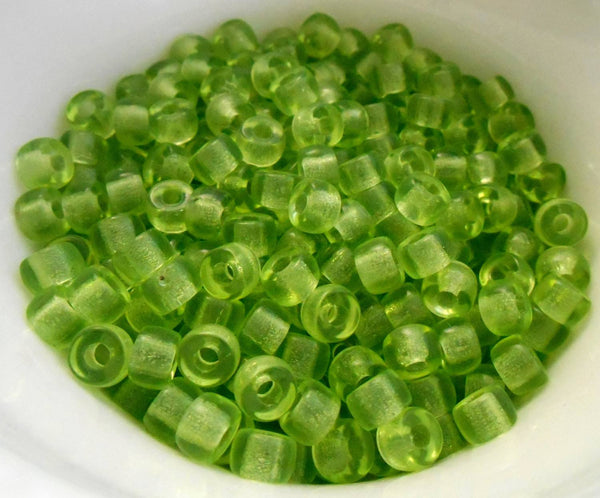 Fifty 6mm Czech glass Transparent Peridot Green pony roller beads, large hole crow beads, C6350 - Glorious Glass Beads