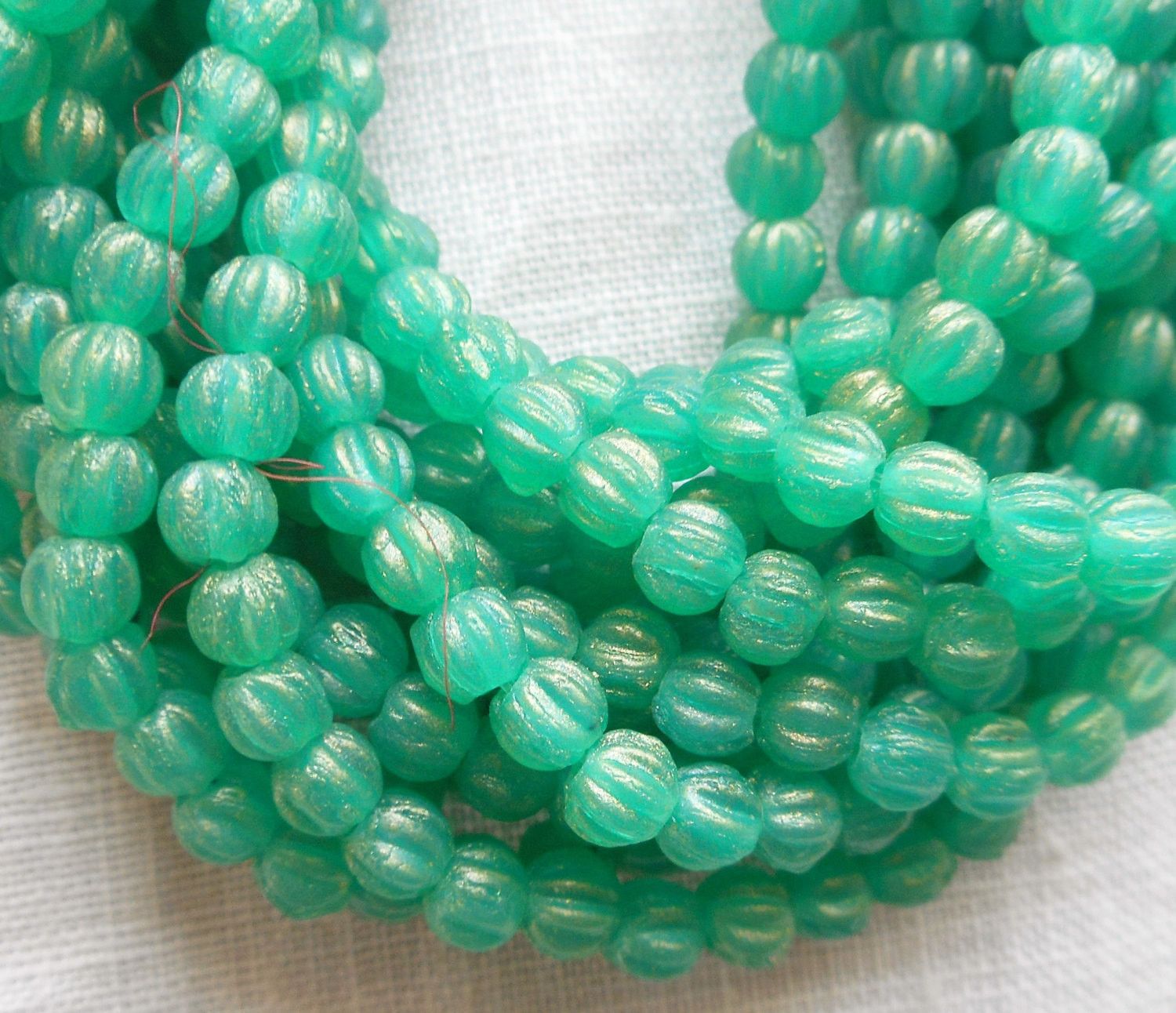 Lot of 100 3mm Sueded Gold Atlantis Green melon beads, Czech pressed glass beads C02101 - Glorious Glass Beads