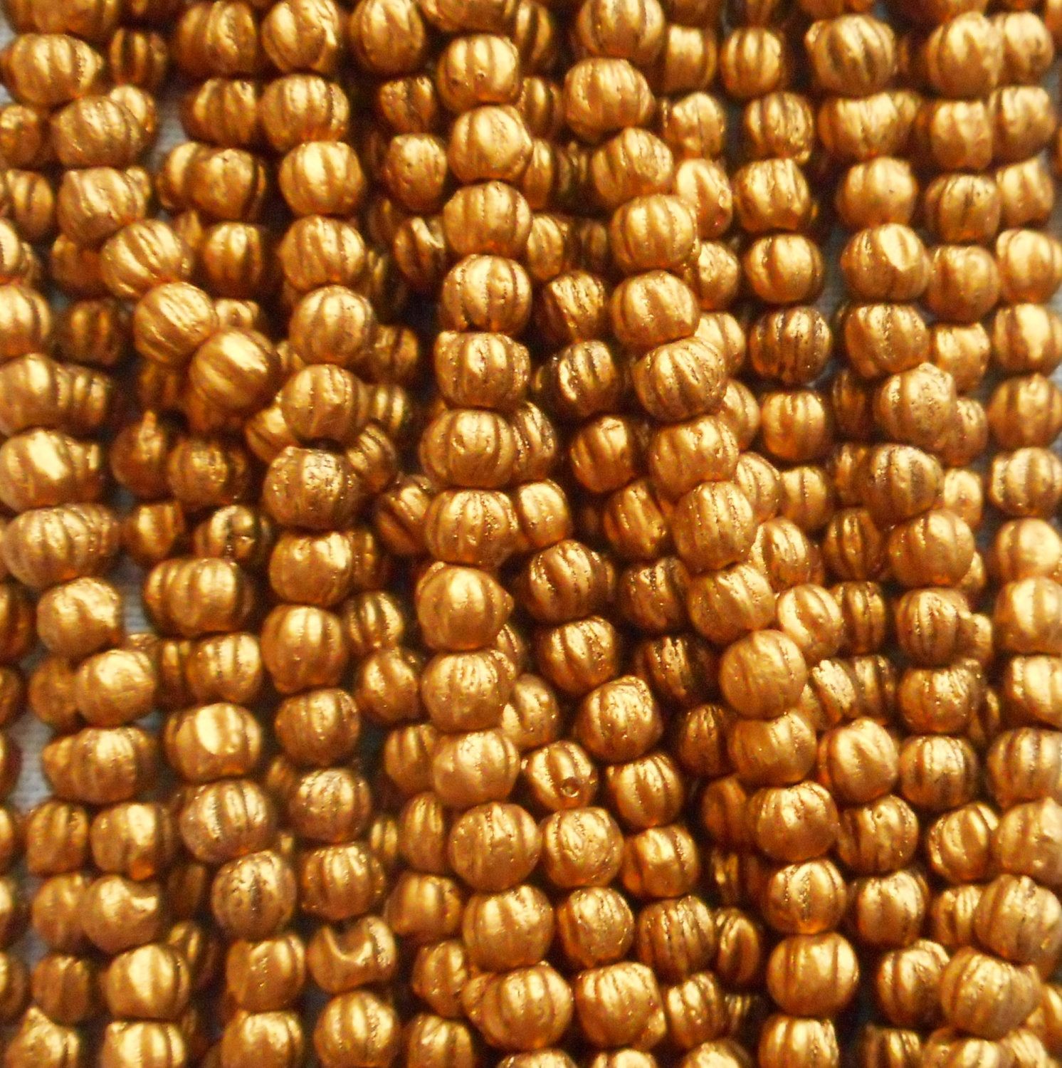 Lot of 100 3mm Matte Metallic Antique Gold melon beads, Czech pressed glass beads C61150 - Glorious Glass Beads