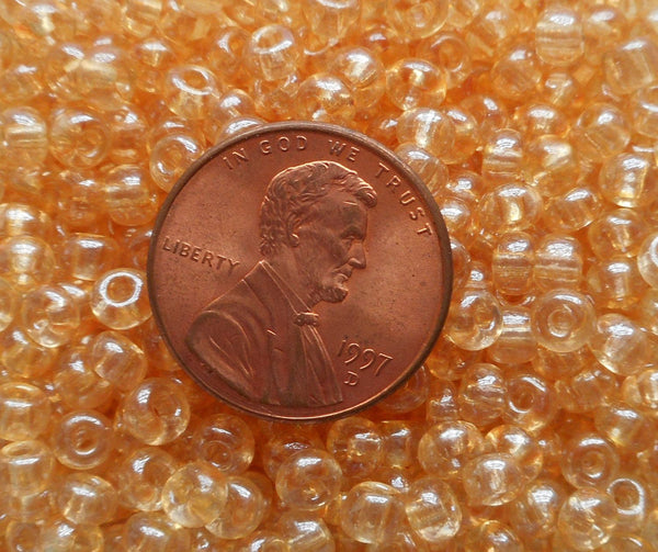 One pkg 24 grams Lumi Champagne, light amber Czech 6/0 glass seed beads, size 6 Preciosa Rocaille 4mm spacer beads, large, big hole C4624 - Glorious Glass Beads