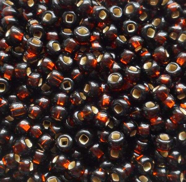 One pkg 24 grams Smoky Topaz, Brown Silver Lined Czech 6/0 glass seed beads, size 6 Preciosa Rocaille 4mm spacer beads, large, big hole C0824