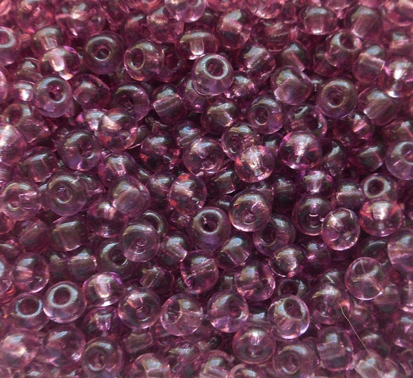 One pkg 24 grams transparent Light Amethyst, Purple Czech 6/0 glass seed beads, size 6 Preciosa Rocaille 4mm spacer beads, large, big hole C9324
