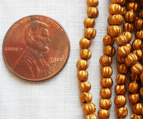 Lot of 100 3mm Matte Metallic Antique Gold melon beads, Czech pressed glass beads C61150 - Glorious Glass Beads