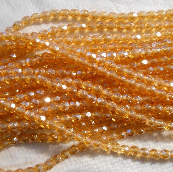 Fifty 4mm Luster Topaz, Amber Czech glass firepolished faceted round beads, C5550