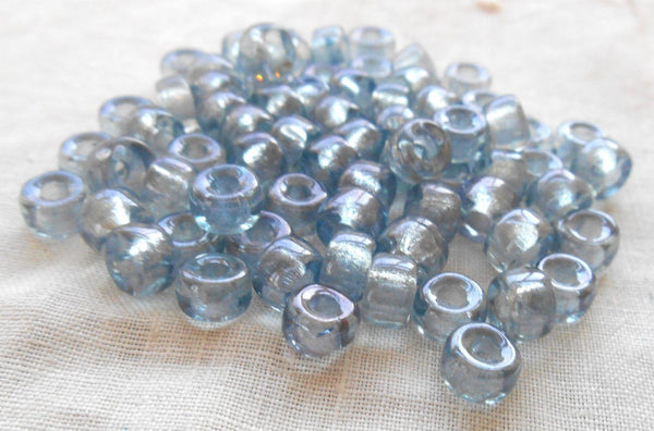 Fifty 6mm Czech iridescent Lumi Blue glass pony, roller beads, large hole crow beads, C1550 - Glorious Glass Beads