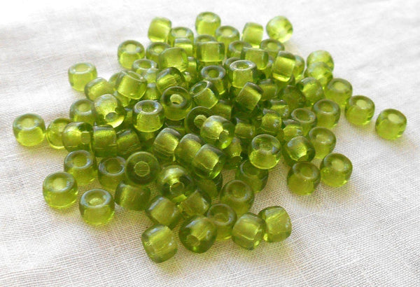 Fifty 6mm Green Olivine Czech glass pony roller beads, large hole crow beads, C7350 - Glorious Glass Beads