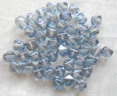 Fifty 6mm iridescent Lumi Blue bicones pressed glass Czech bicone beads, C7850 - Glorious Glass Beads