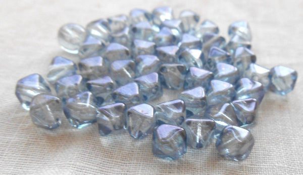 Fifty 6mm iridescent Lumi Blue bicones pressed glass Czech bicone beads, C7850 - Glorious Glass Beads