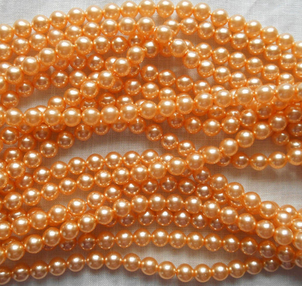 Fifty 6mm light orange glass pearl druk beads, Preciosa Czech round, smooth glass pearls, C0650 - Glorious Glass Beads