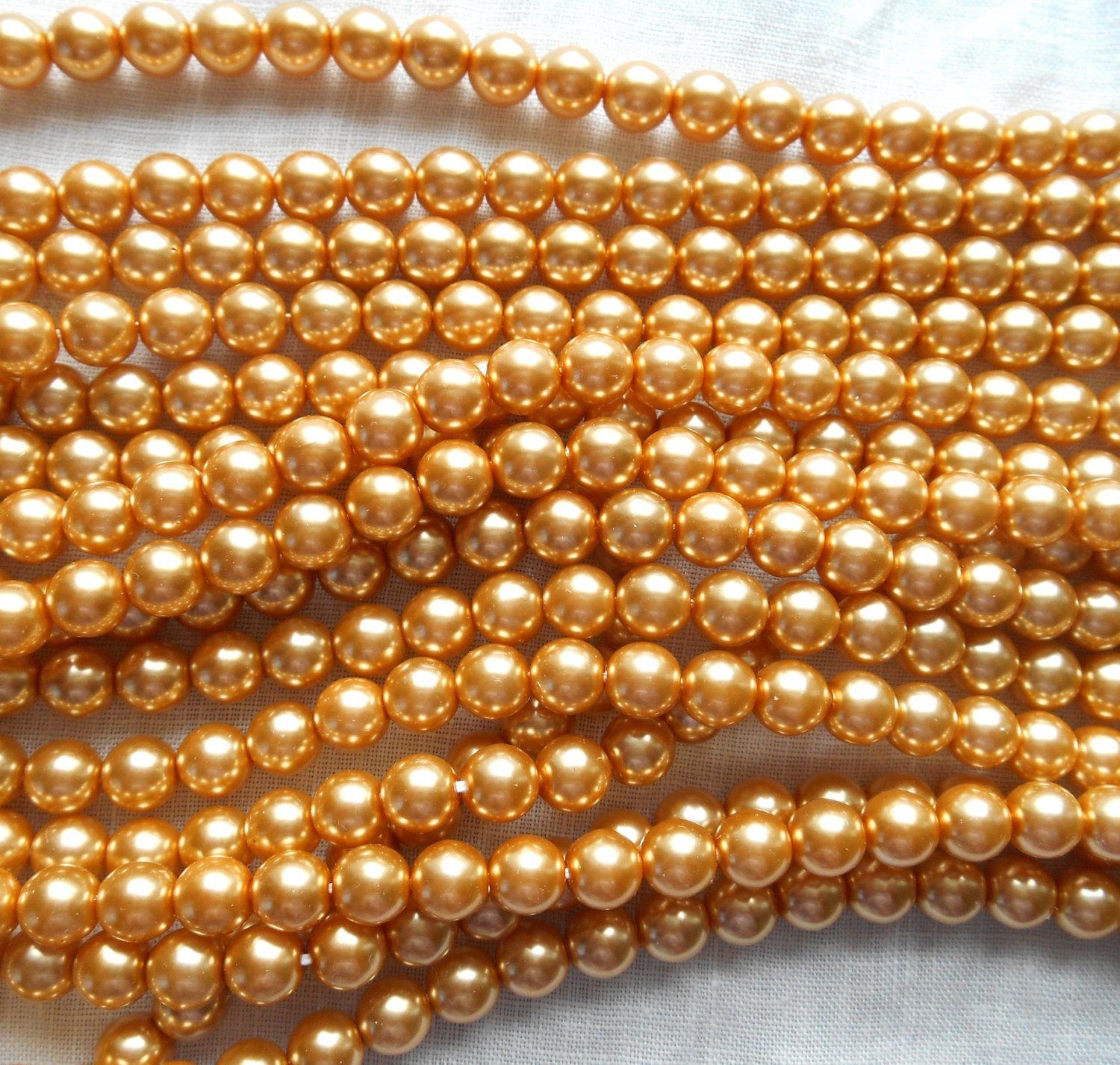 6mm luster red pearl-coated Czech glass druk pearls 8 strand (33 bead – My  Supplies Source