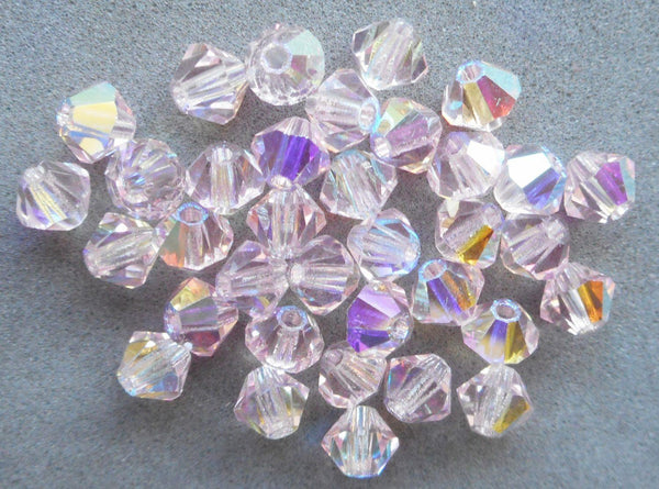 Lot of 24 4mm Czech Light Rose Pink AB glass faceted bicone beads, Preciosa Crystal pink AB bicones 5601 - Glorious Glass Beads