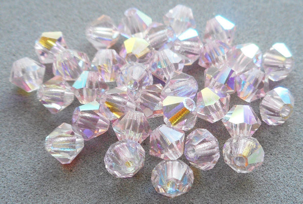 Lot of 24 4mm Czech Light Rose Pink AB glass faceted bicone beads, Preciosa Crystal pink AB bicones 5601 - Glorious Glass Beads