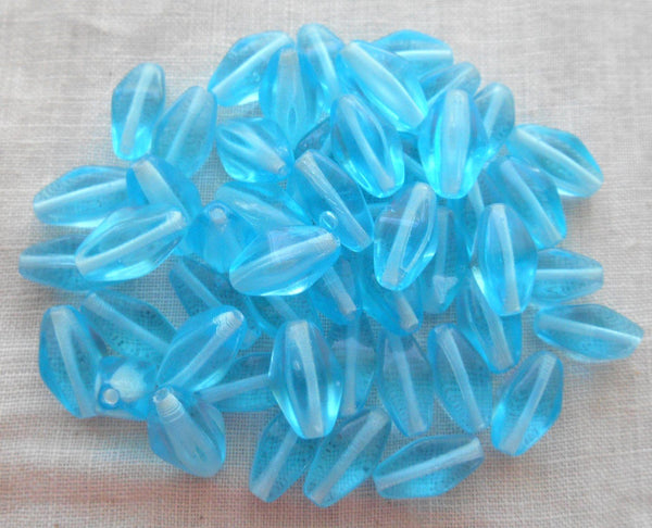Lot of 25 11mm x 7mm Aqua Blue Czech glass lantern or tube beads, C9125 - Glorious Glass Beads