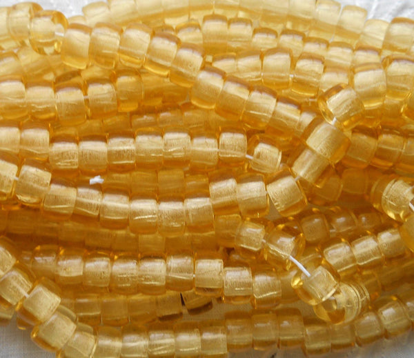 Lot of 25 9mm Czech light amber, glass pony roller beads, large hole crow beads, C0093