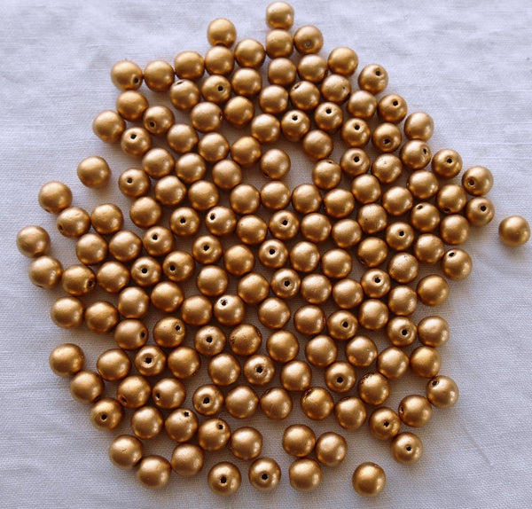 Lot of fifty 6mm Czech Matte Metallic Gold smooth round glass druk beads C0601