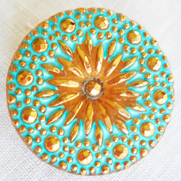 One 22mm Czech glass button, gold starburst with a green turquoise wash, verdigris look decorative shank button 52301