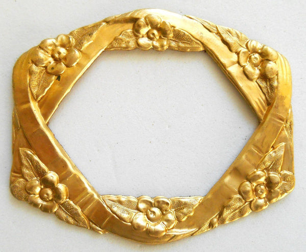 One raw brass stamping, oval frame in flowers and ribbons, pendant, connector, ring, 55 x 46mm, made in the USA, C8601
