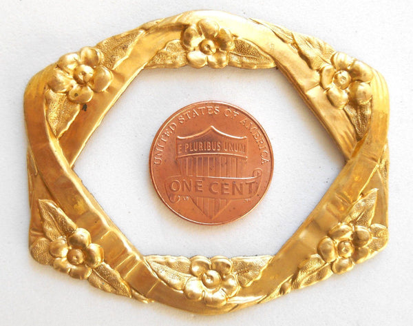 One raw brass stamping, oval frame in flowers and ribbons, pendant, connector, ring, 55 x 46mm, made in the USA, C8601 - Glorious Glass Beads