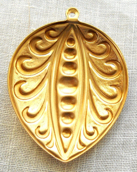 One Raw Brass Stamping, Victorian, Art Nouveau, pea pod like pendant, charm, drop, earring, 39mm x 29mm, made in the USA, C2201 - Glorious Glass Beads
