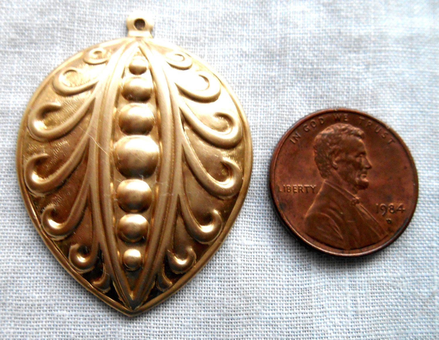 One Raw Brass Stamping, Victorian, Art Nouveau, pea pod like pendant, charm, drop, earring, 39mm x 29mm, made in the USA, C2201 - Glorious Glass Beads